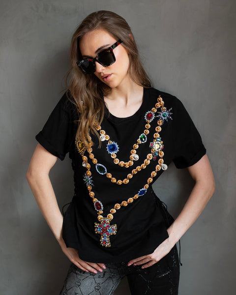 Blusa negra con cintillas rosary