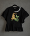 Blusa con olanes Capricornio