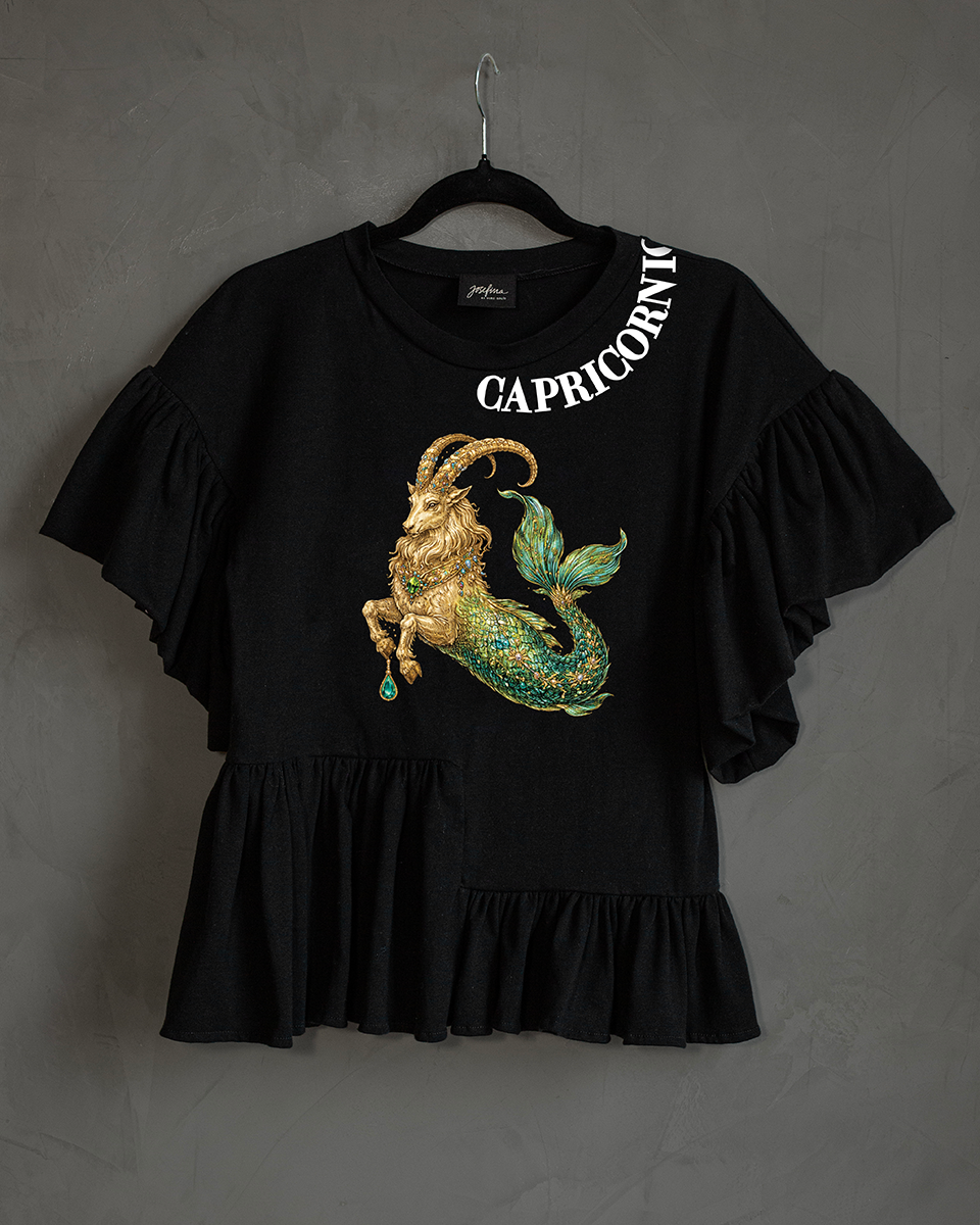 Blusa con olanes Capricornio