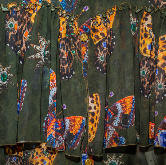Camisera sin hombros con olan mariposas