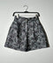 Short gris brocado