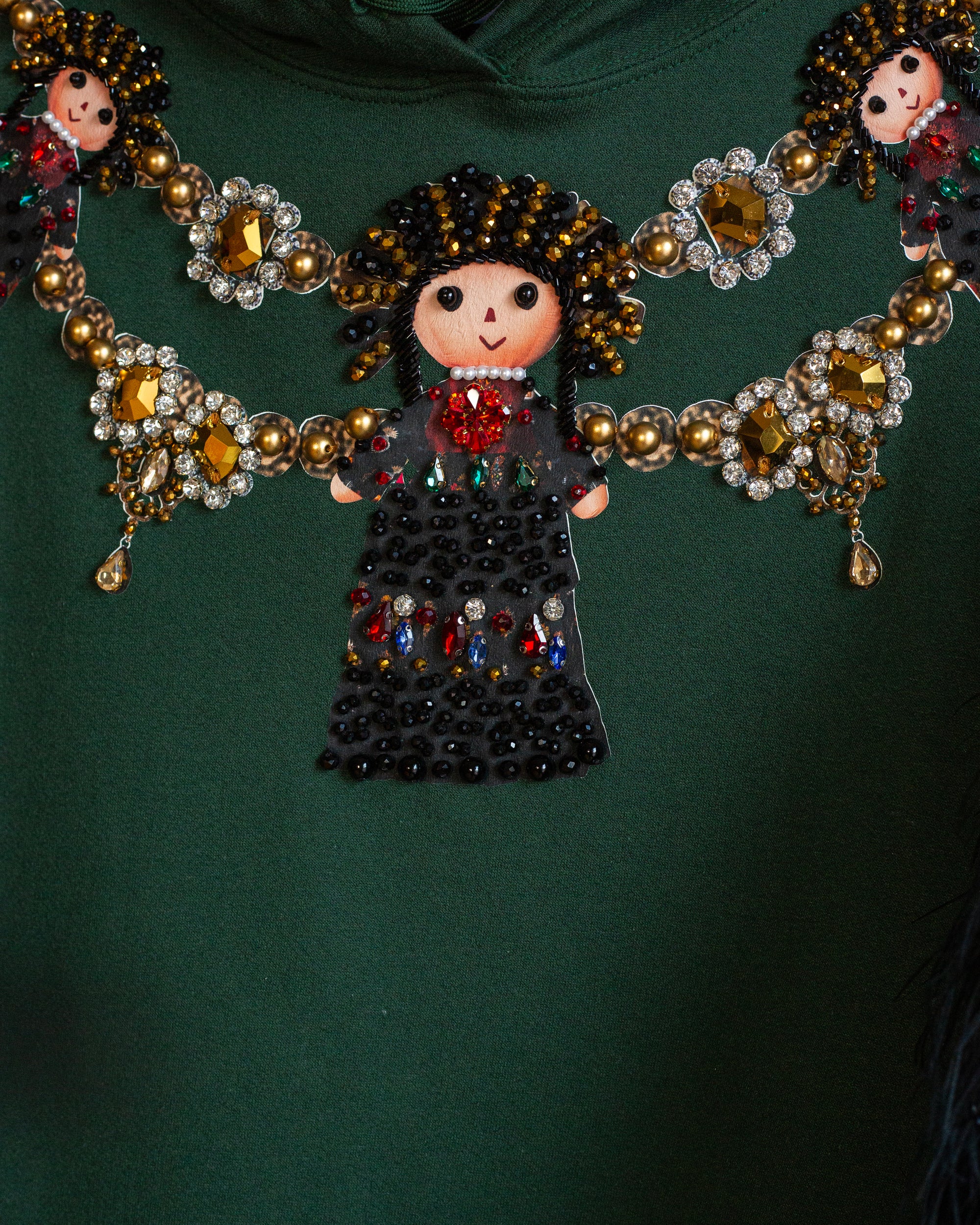 Hoodie lele con plumas