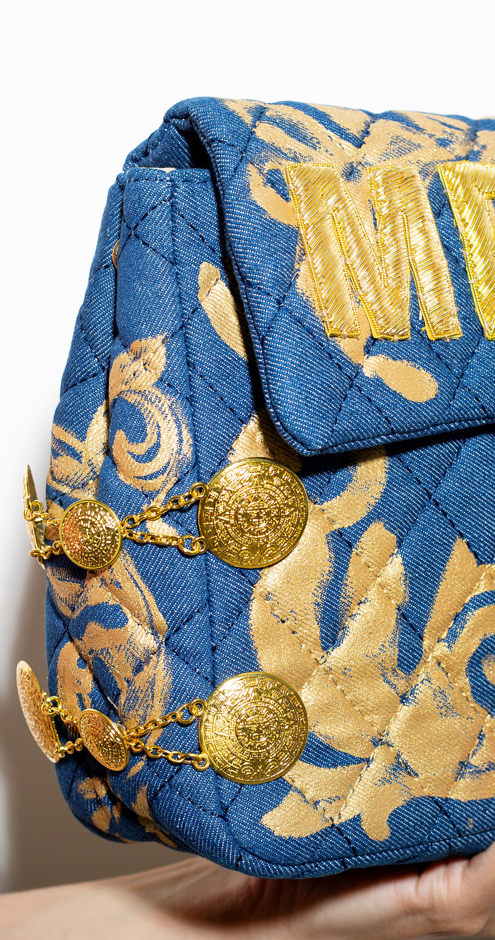 QUILTED DENIM CLUTCH MEXICO