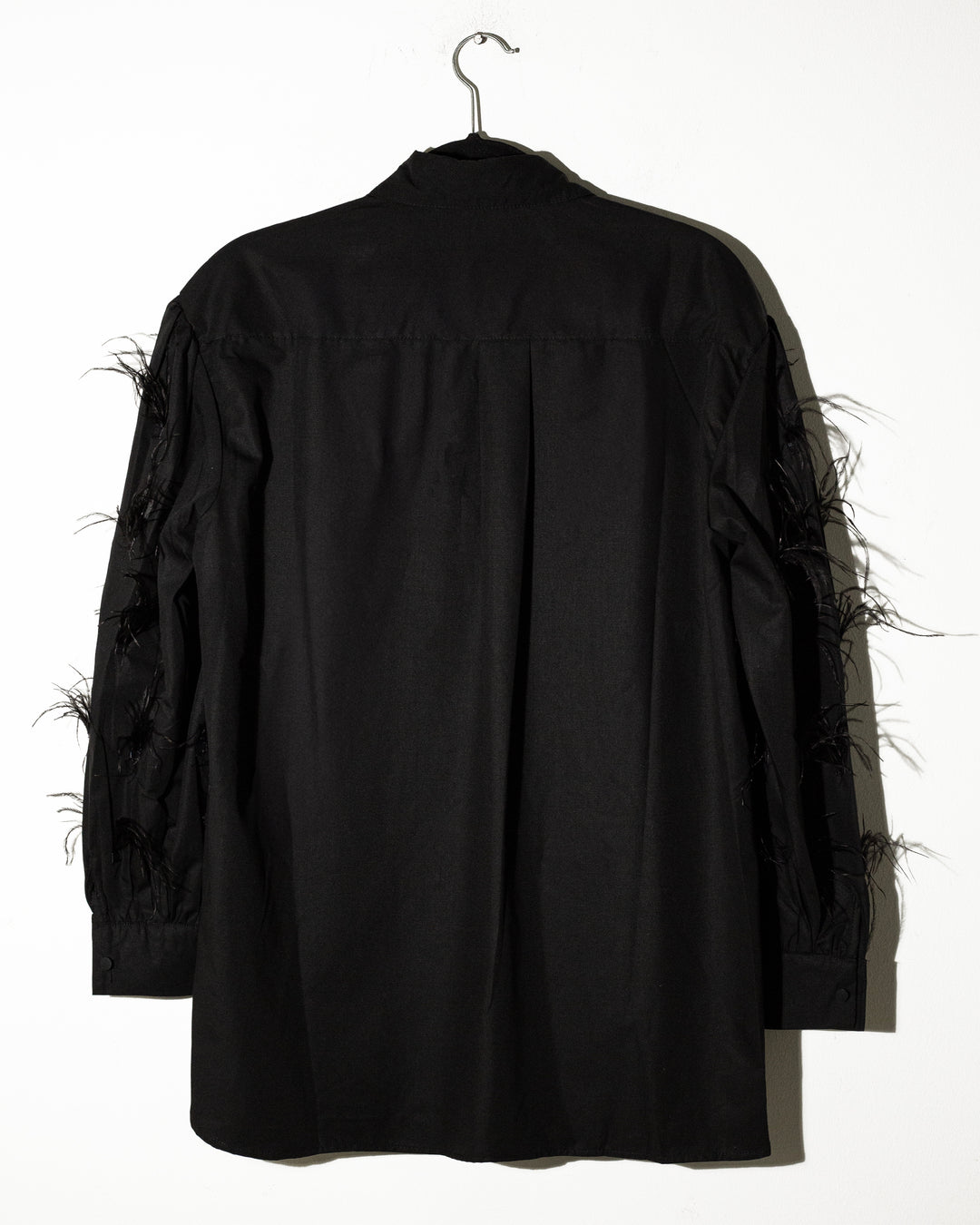 Camisera con plumas Sagrado Corazon
