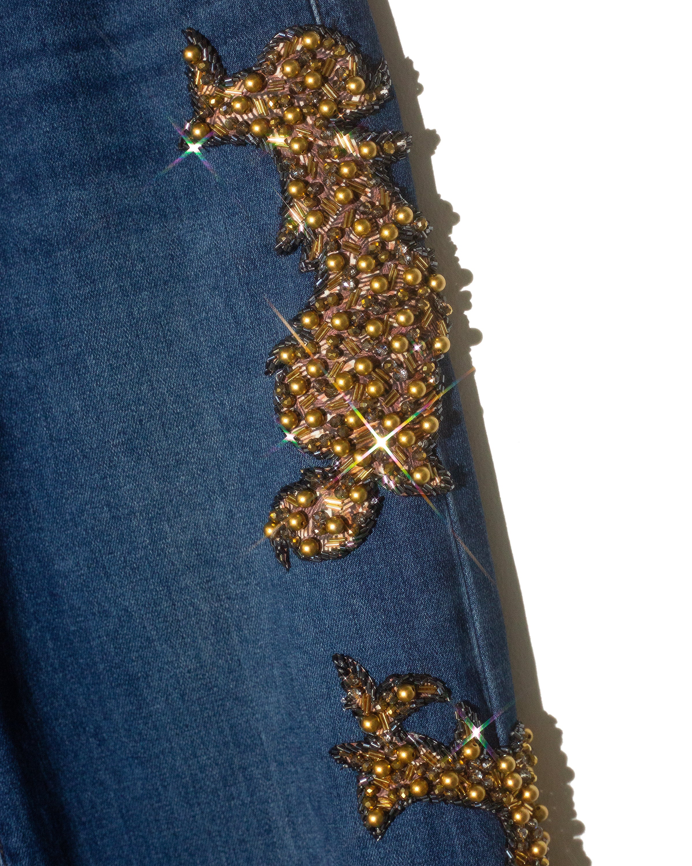 Wide leg jeans con grecas