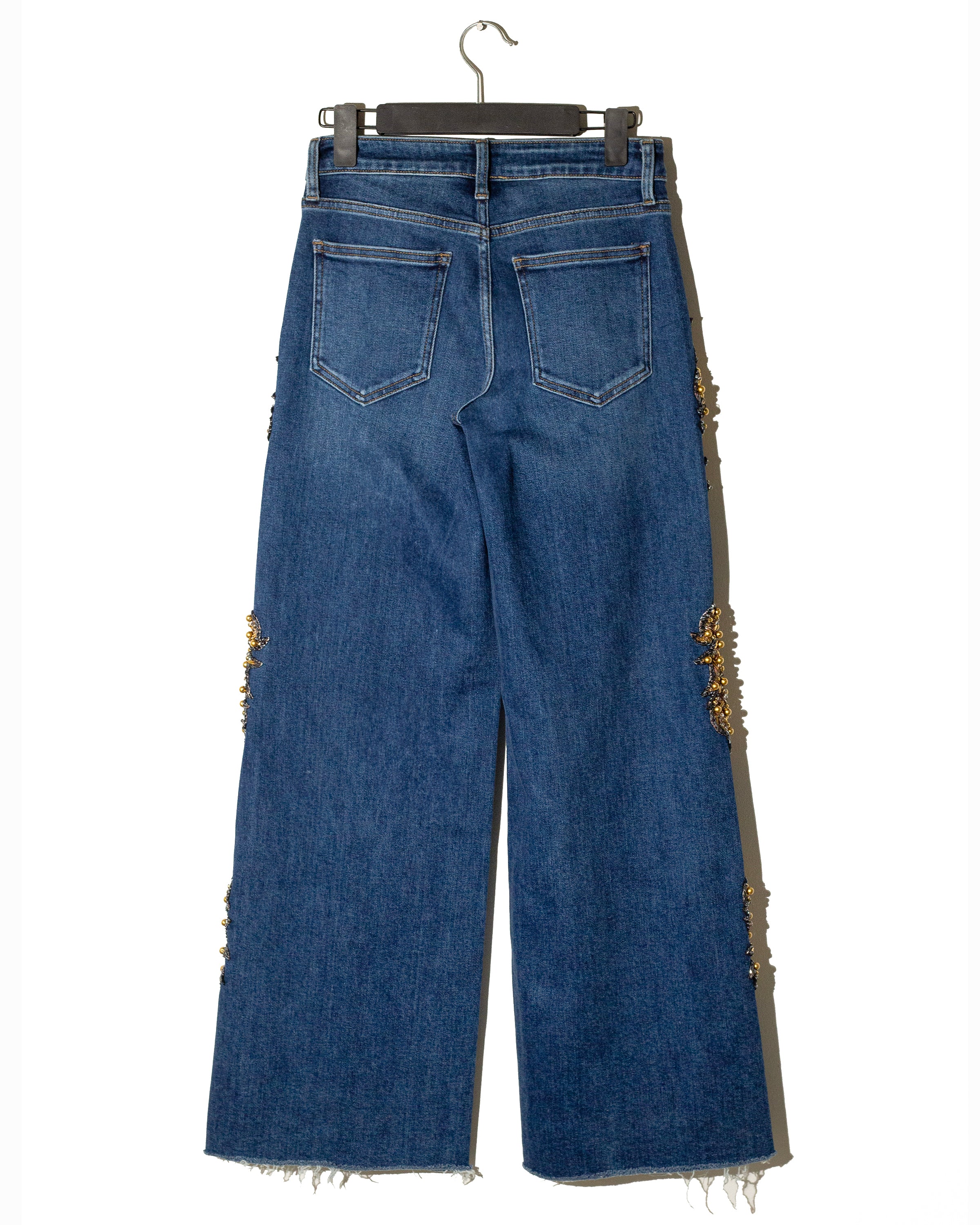 Wide leg jeans con grecas