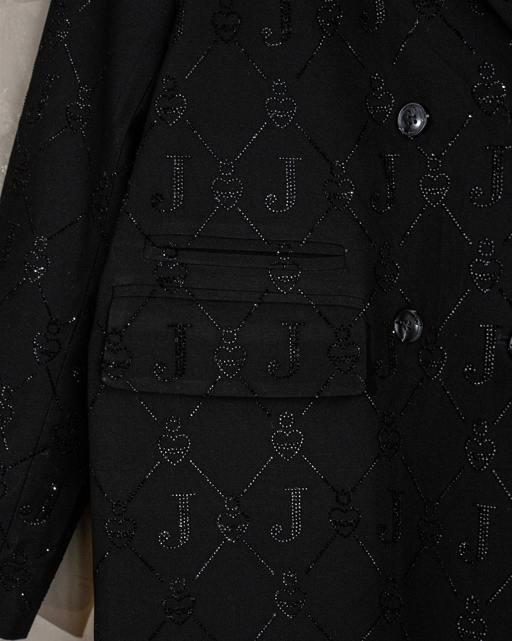 Blazer negro con cristales Logomaía