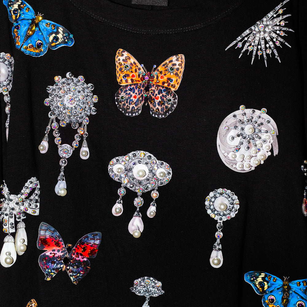 Blusa negra charms con mangas globo