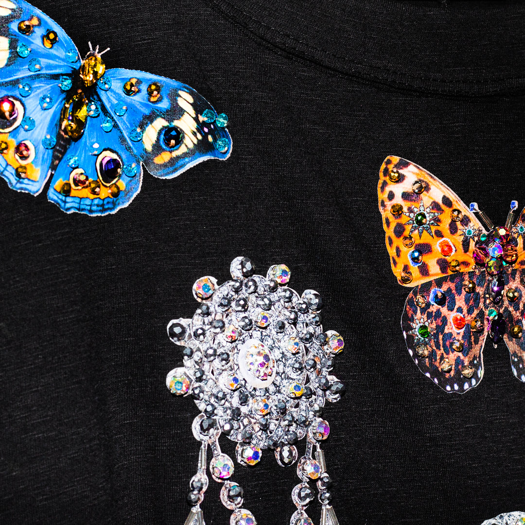 Blusa negra charms con mangas globo