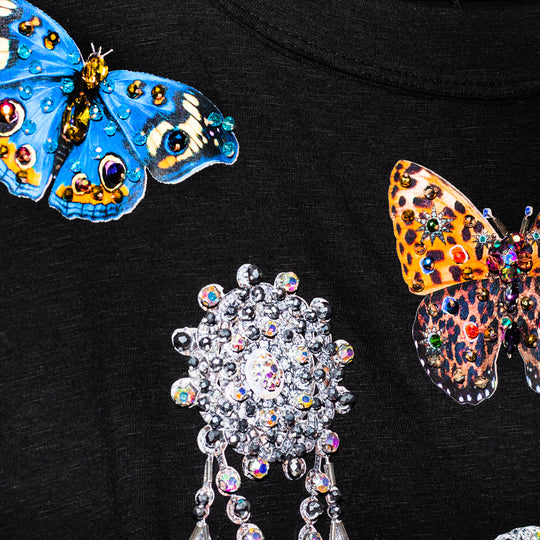 Blusa negra charms con mangas globo