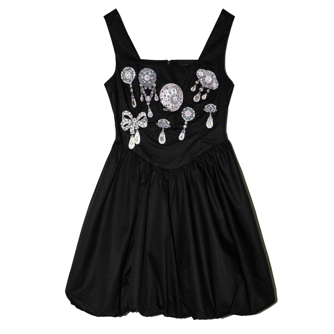 Vestido con falda globo charms