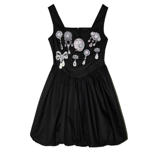 Vestido con falda globo charms