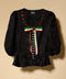 Blusa negra con moño tricolor