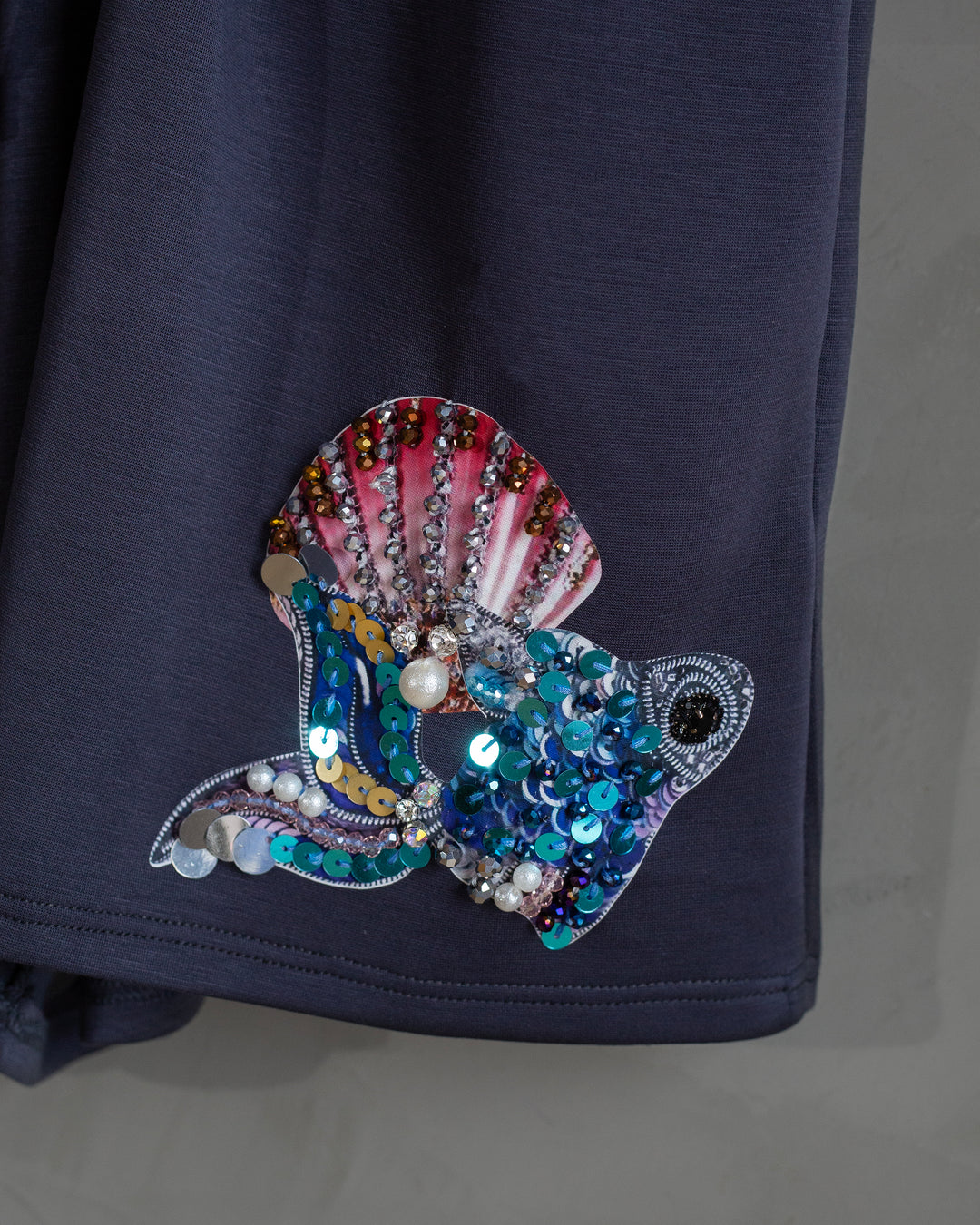 Romper gris collar seashells