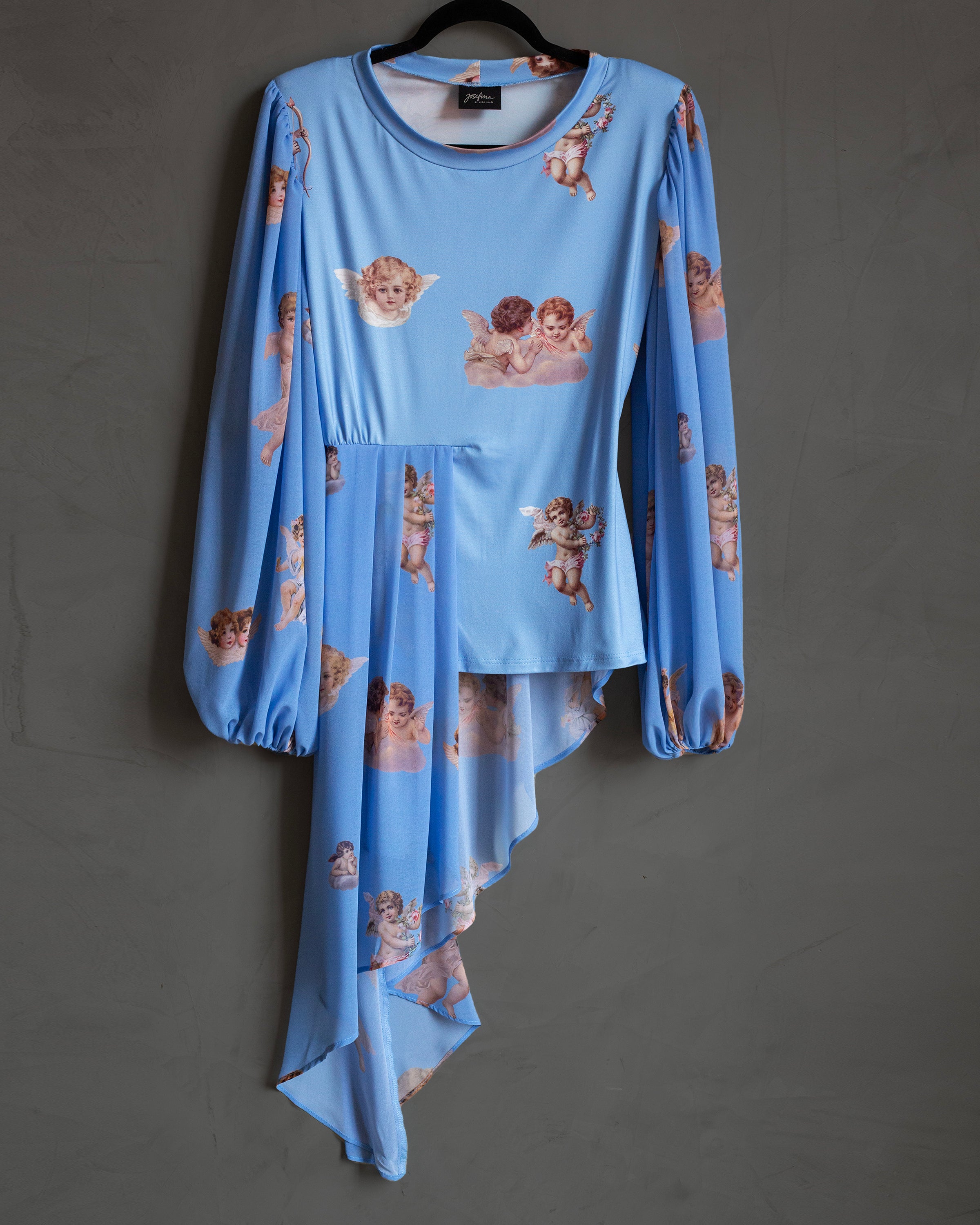 Blusa celeste querubines con faldon
