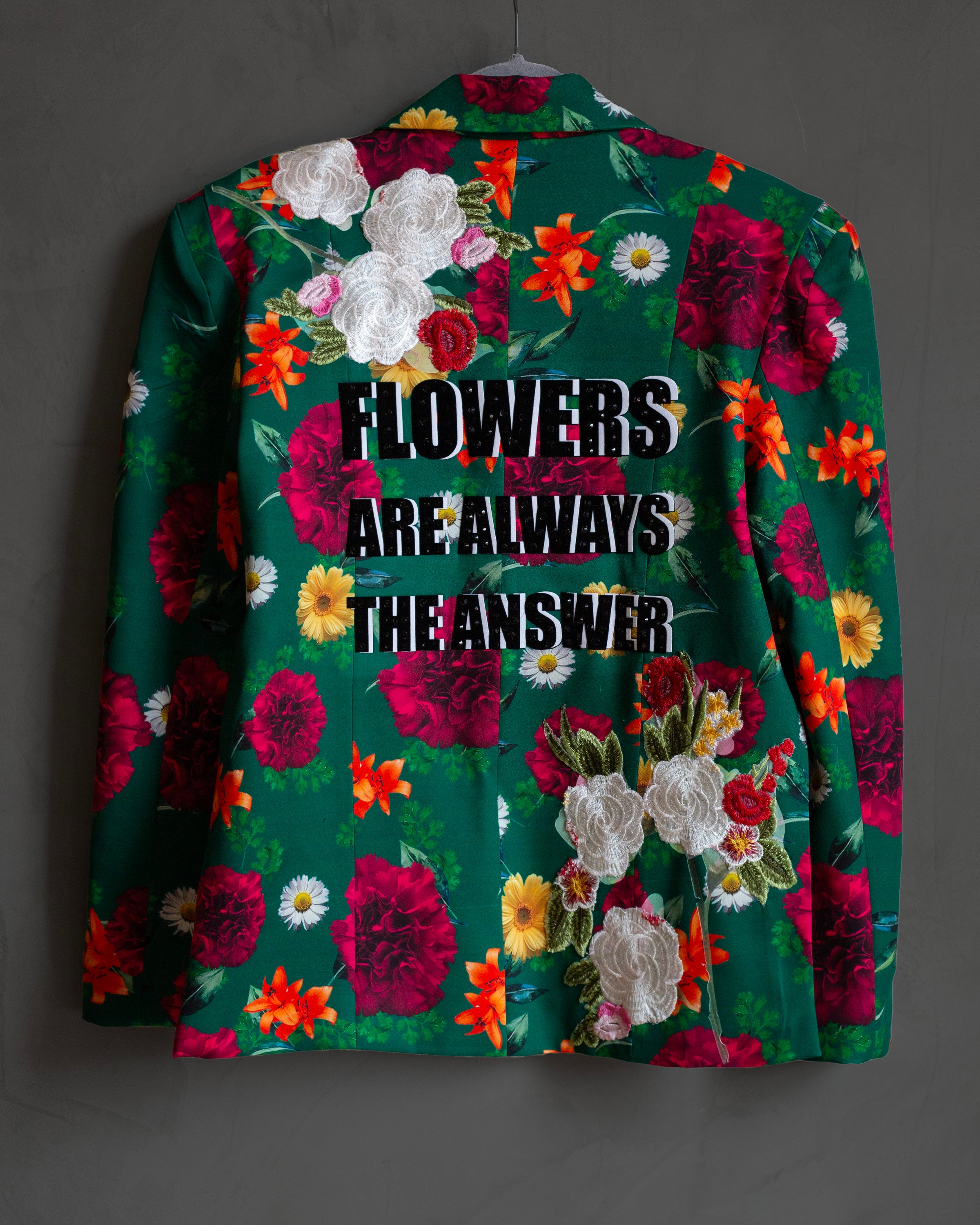 Saco verde con flores "Flowers are always..."