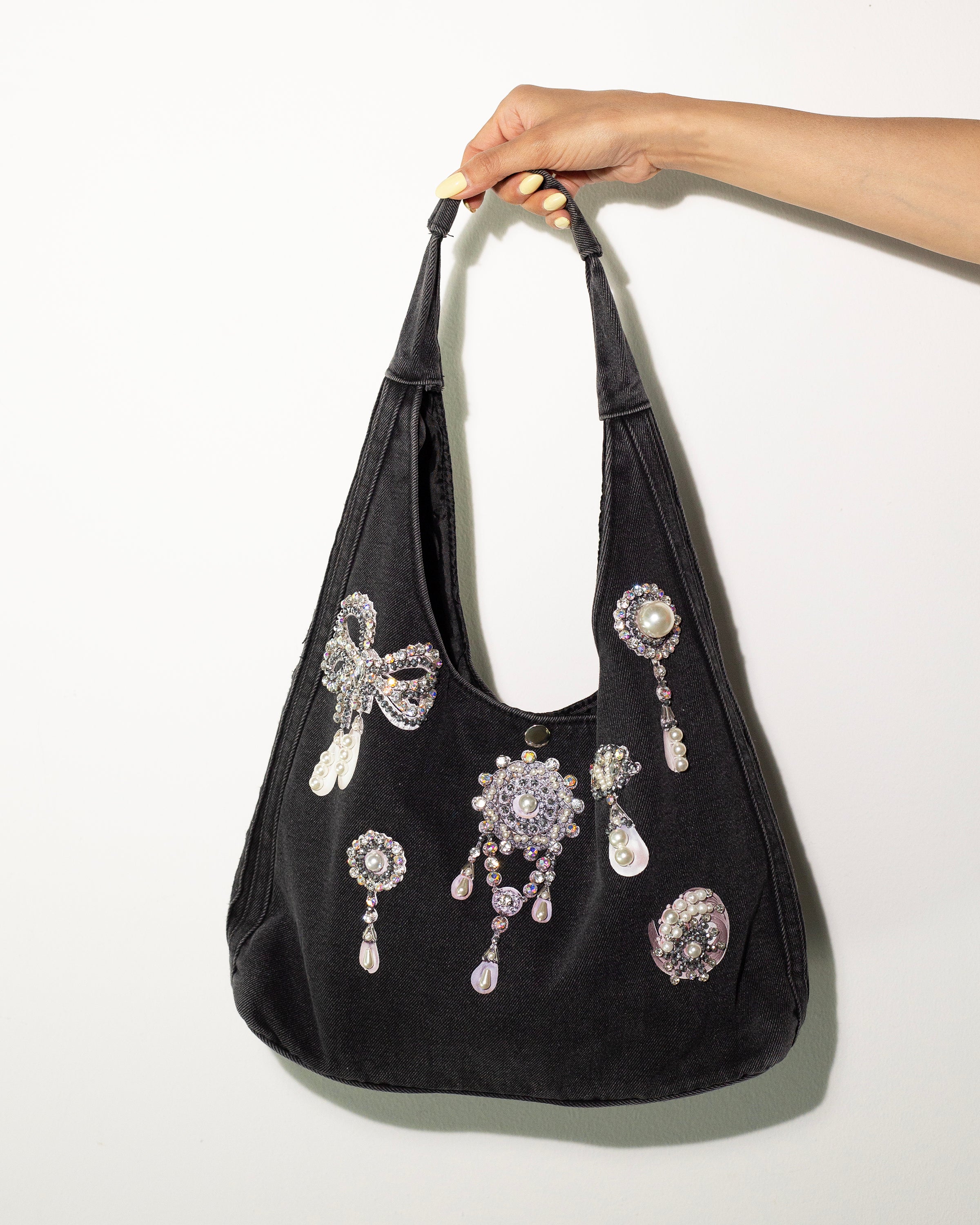 Bolso denim prendedores