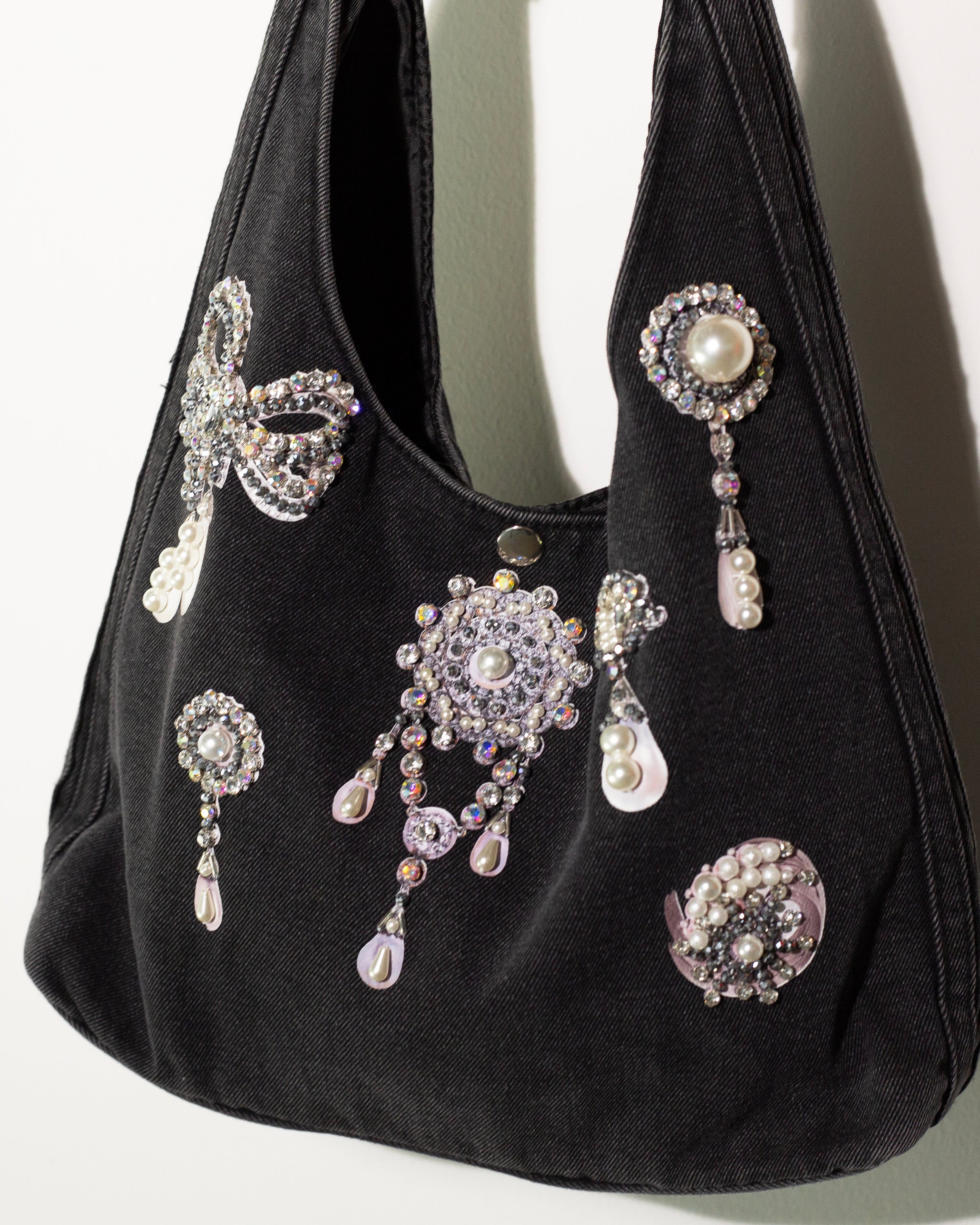 Bolso denim prendedores