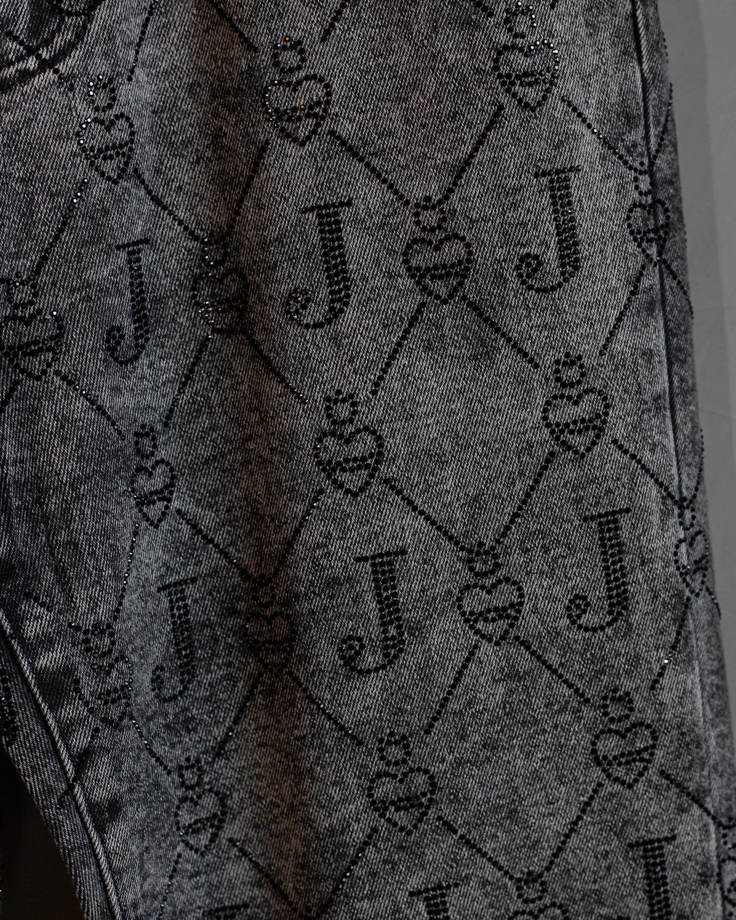 Boyfriend jeans bicolor con cristales logomania