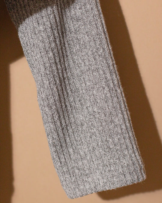 Sweater gris moño con perlas