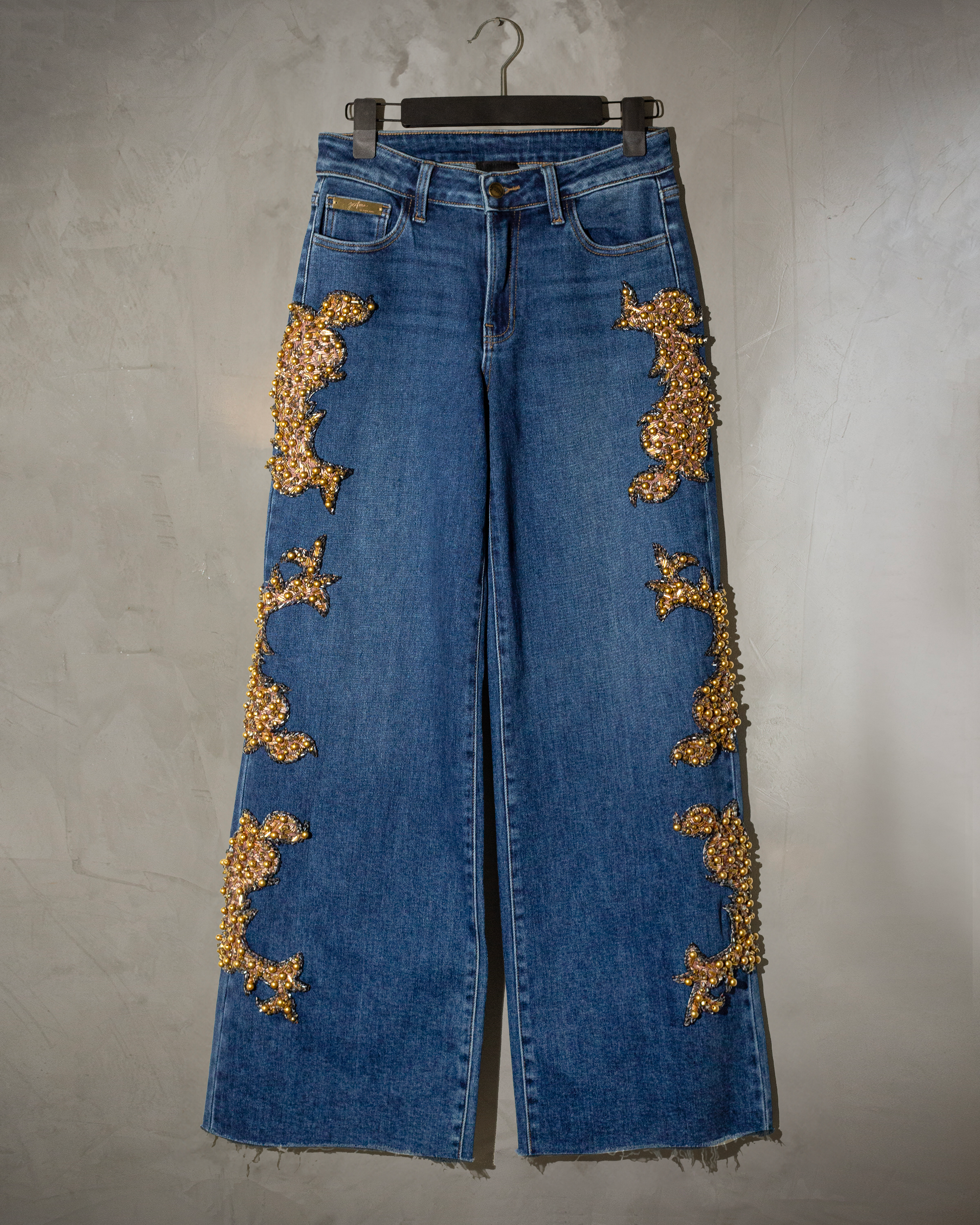 Wide leg jeans con grecas