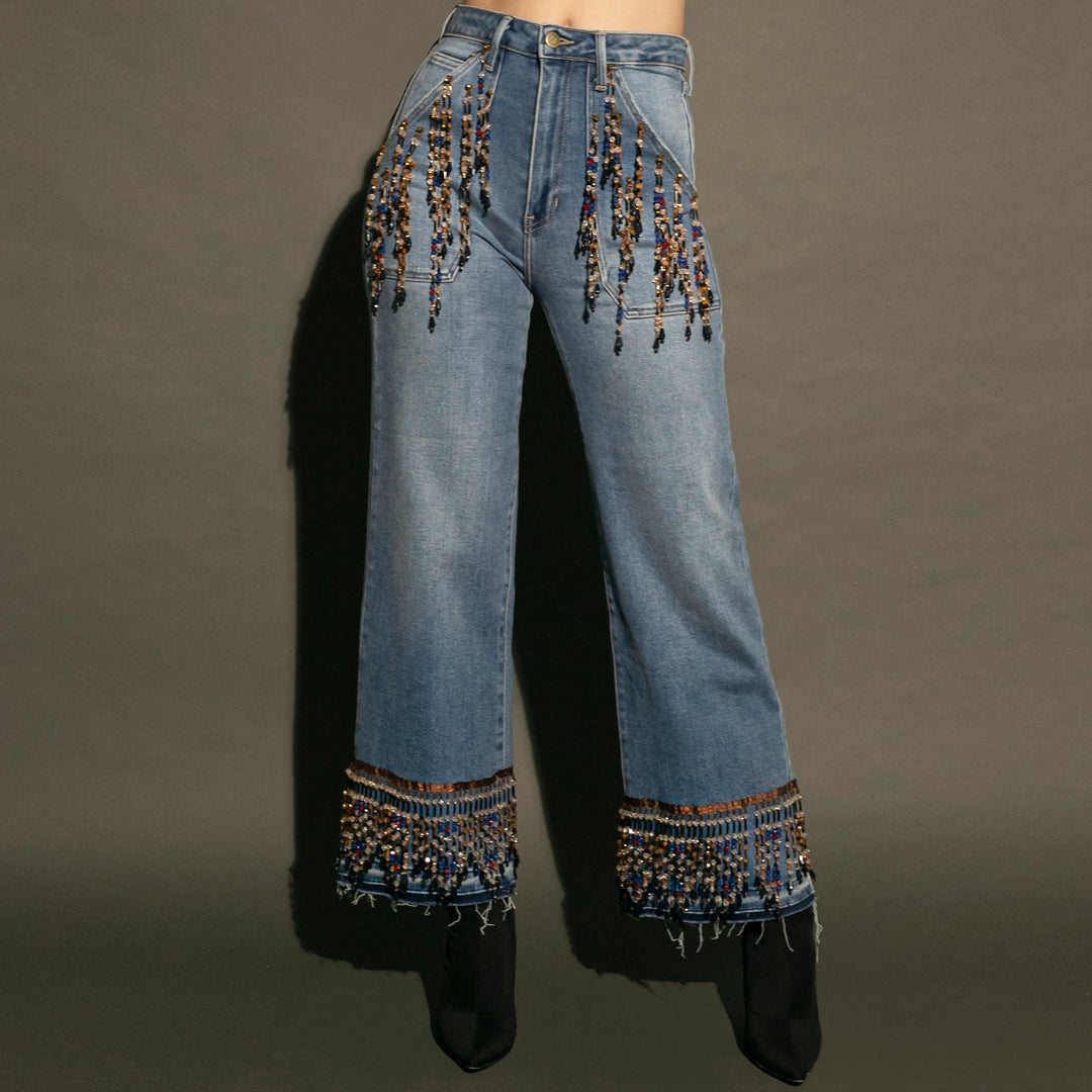 Wide leg jeans con flecos de pedrería