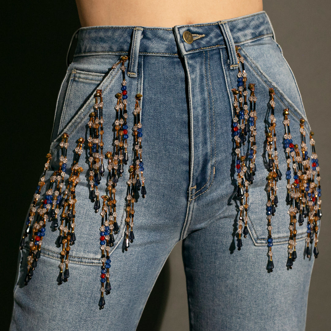 Wide leg jeans con flecos de pedrería
