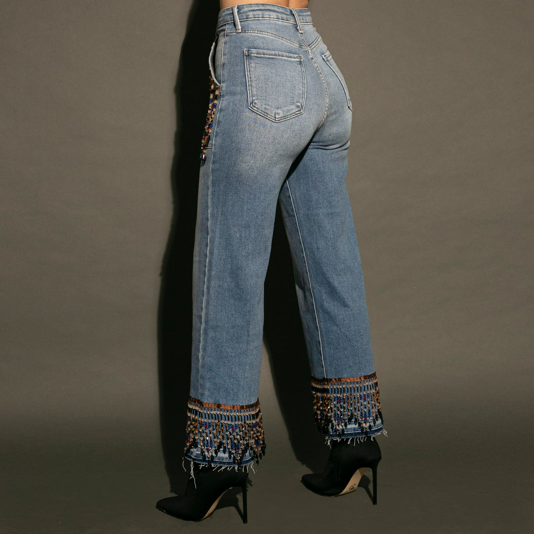 Wide leg jeans con flecos de pedrería