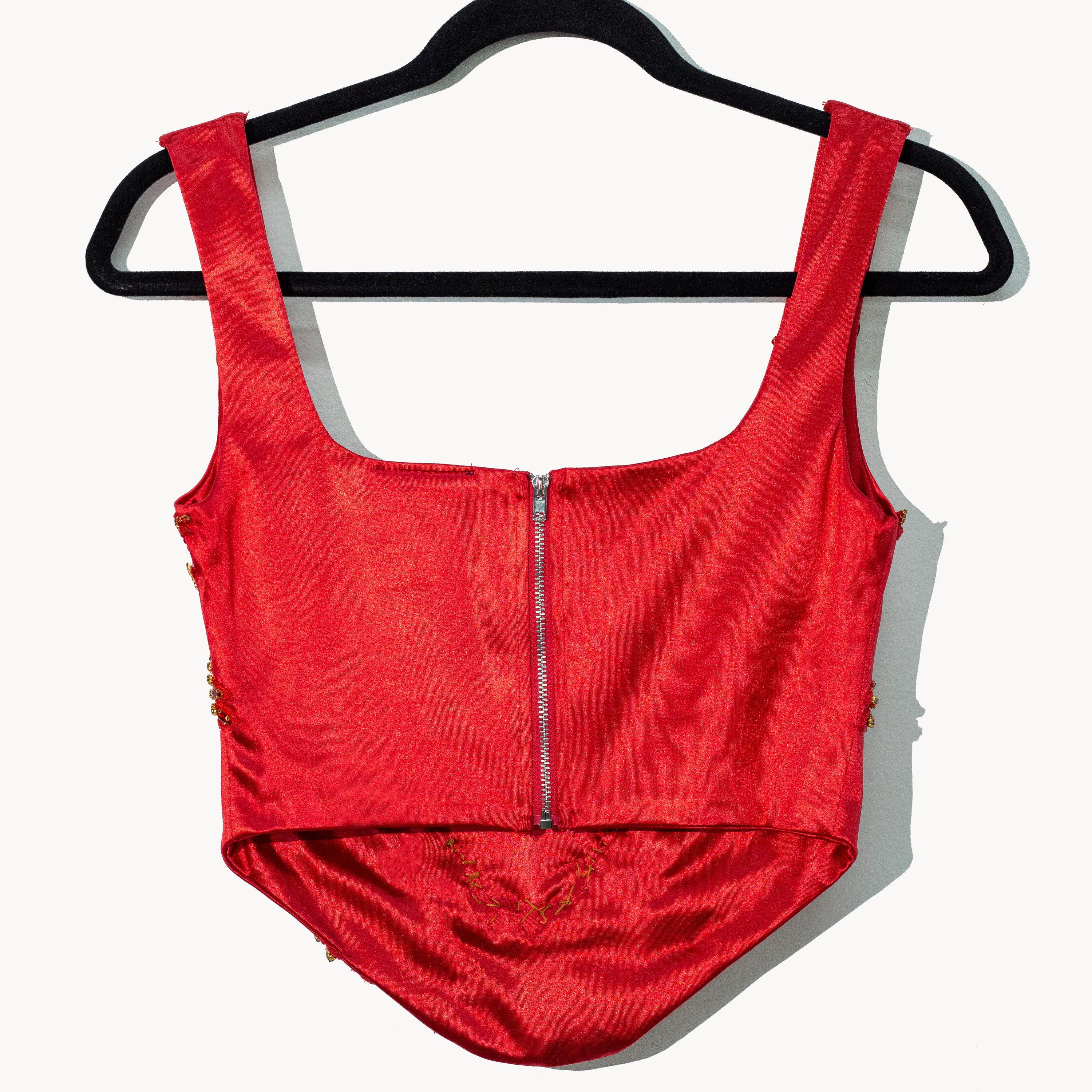 Corset rojo sagrado corazón con monedas