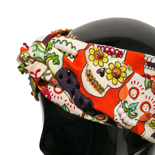 Turbante naranja Frida y calaveras