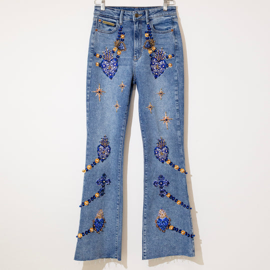 Flared jeans sagrados corazones azules