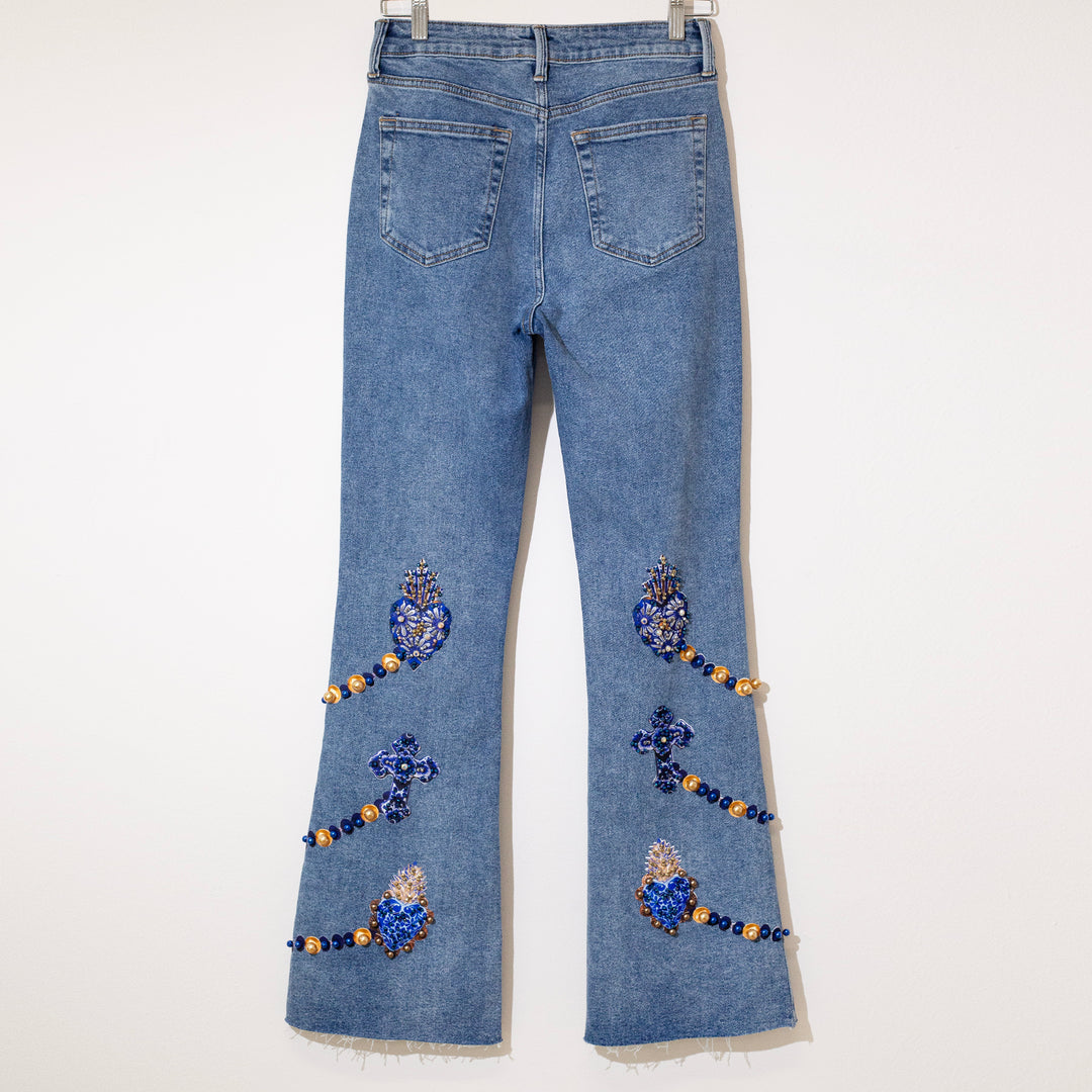 Flared jeans sagrados corazones azules